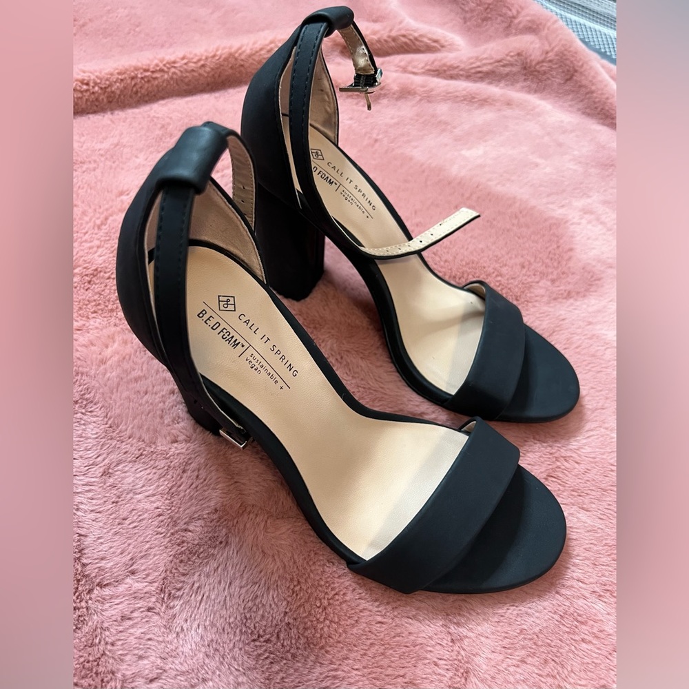 Women, black heels.
